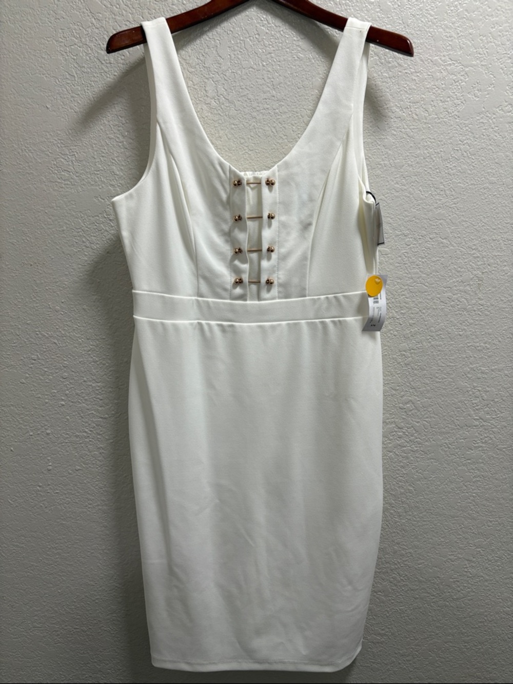 Sleeveless White Midi Dress with Decorative Buttons